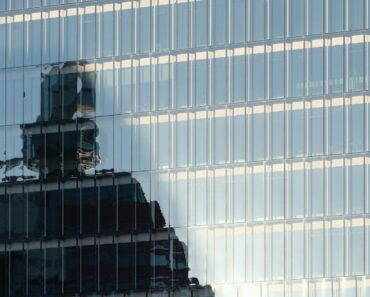 A tall building with a clock on it's side